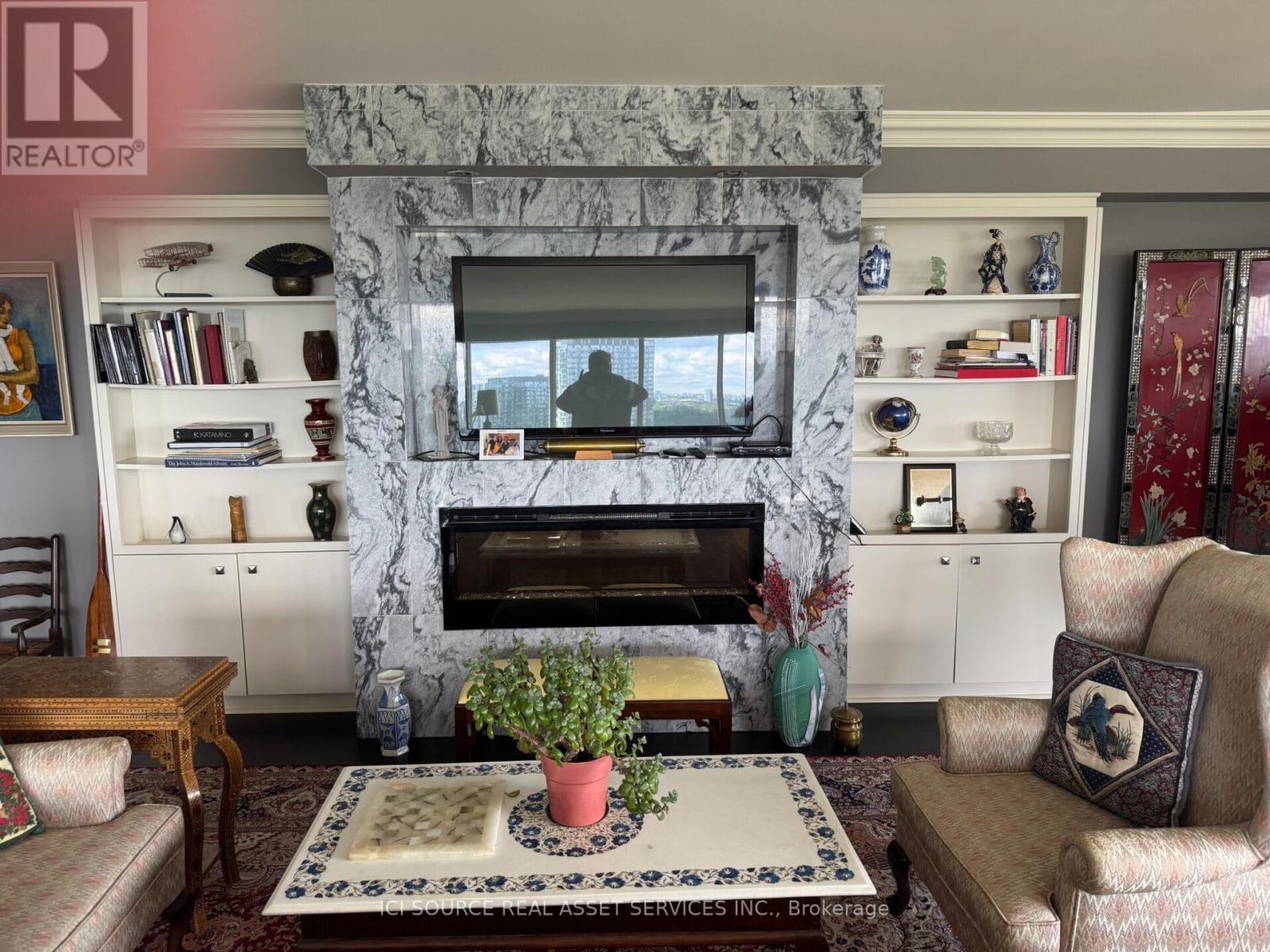 2703 - 2045 Lake Shore Boulevard W, Toronto, ON - Indoor Photo Showing Living Room With Fireplace