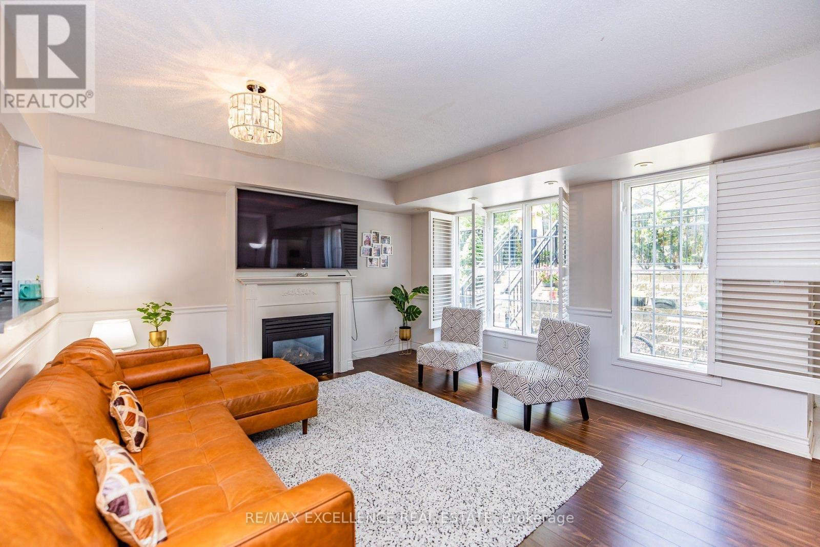 1205 - 5 Everson Drive, Toronto, ON - Indoor Photo Showing Living Room With Fireplace