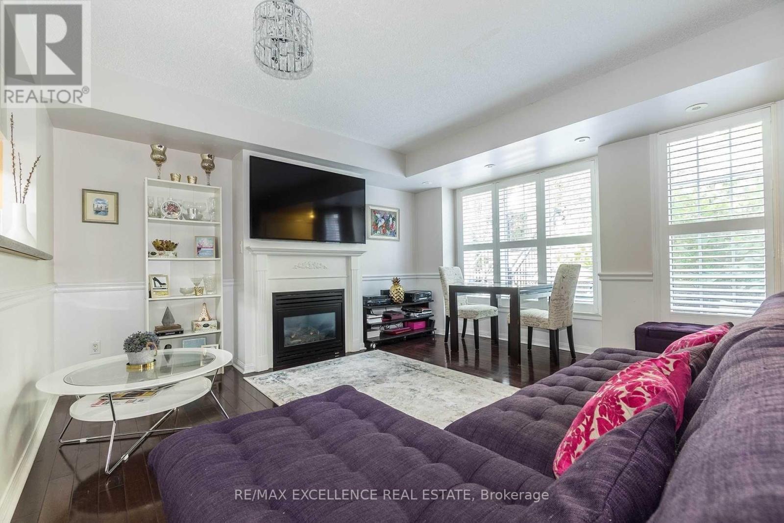 1205 - 5 Everson Drive, Toronto, ON - Indoor Photo Showing Living Room With Fireplace