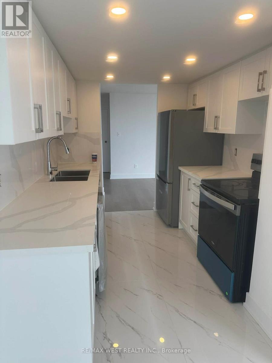 901 - 3 Rowntree Road, Toronto, ON - Indoor Photo Showing Kitchen With Double Sink