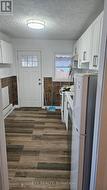 kitchen, door to rear patio -