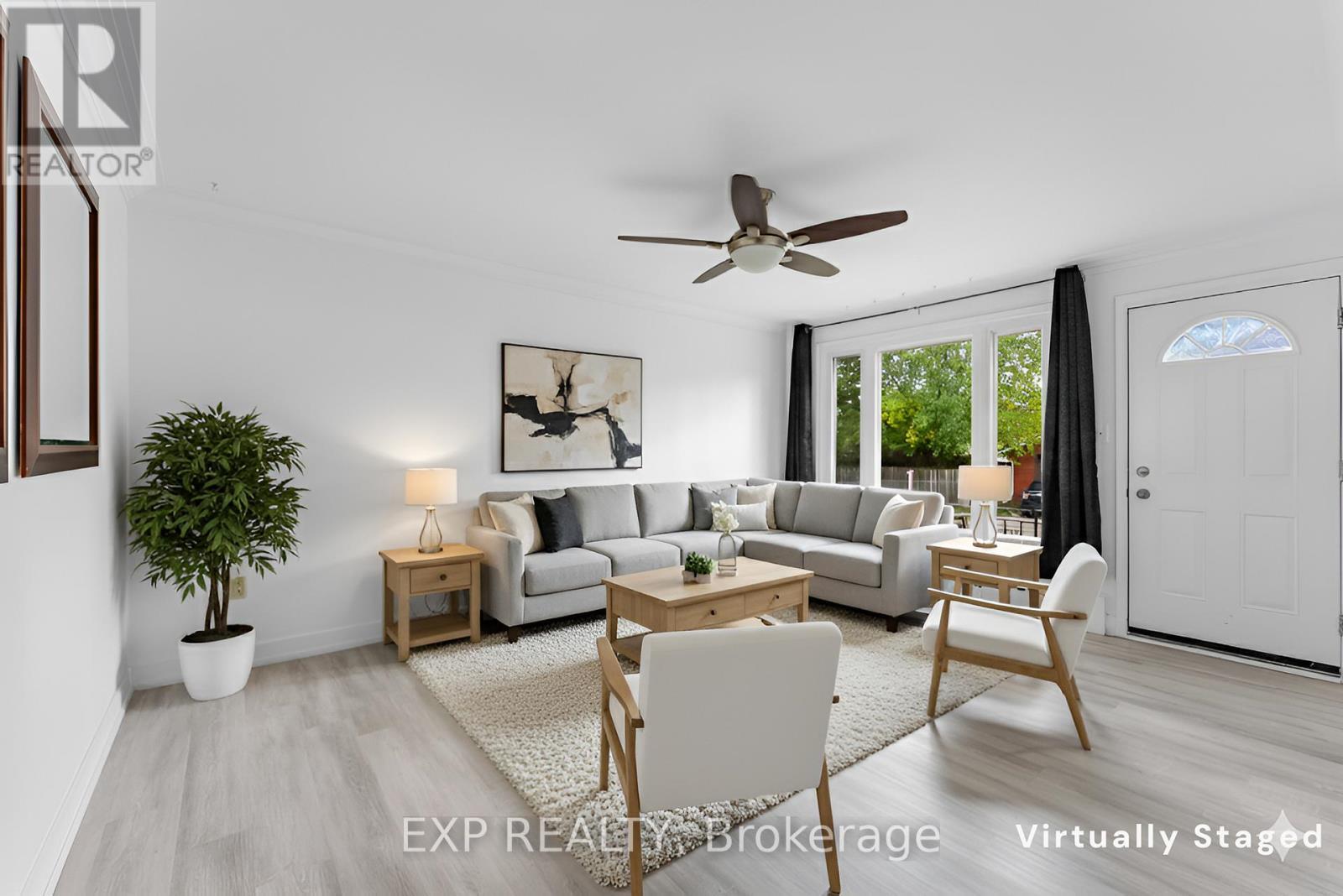 Virtually Staged - 19 Moote Street, St. Catharines (Fairview), ON - Indoor Photo Showing Living Room