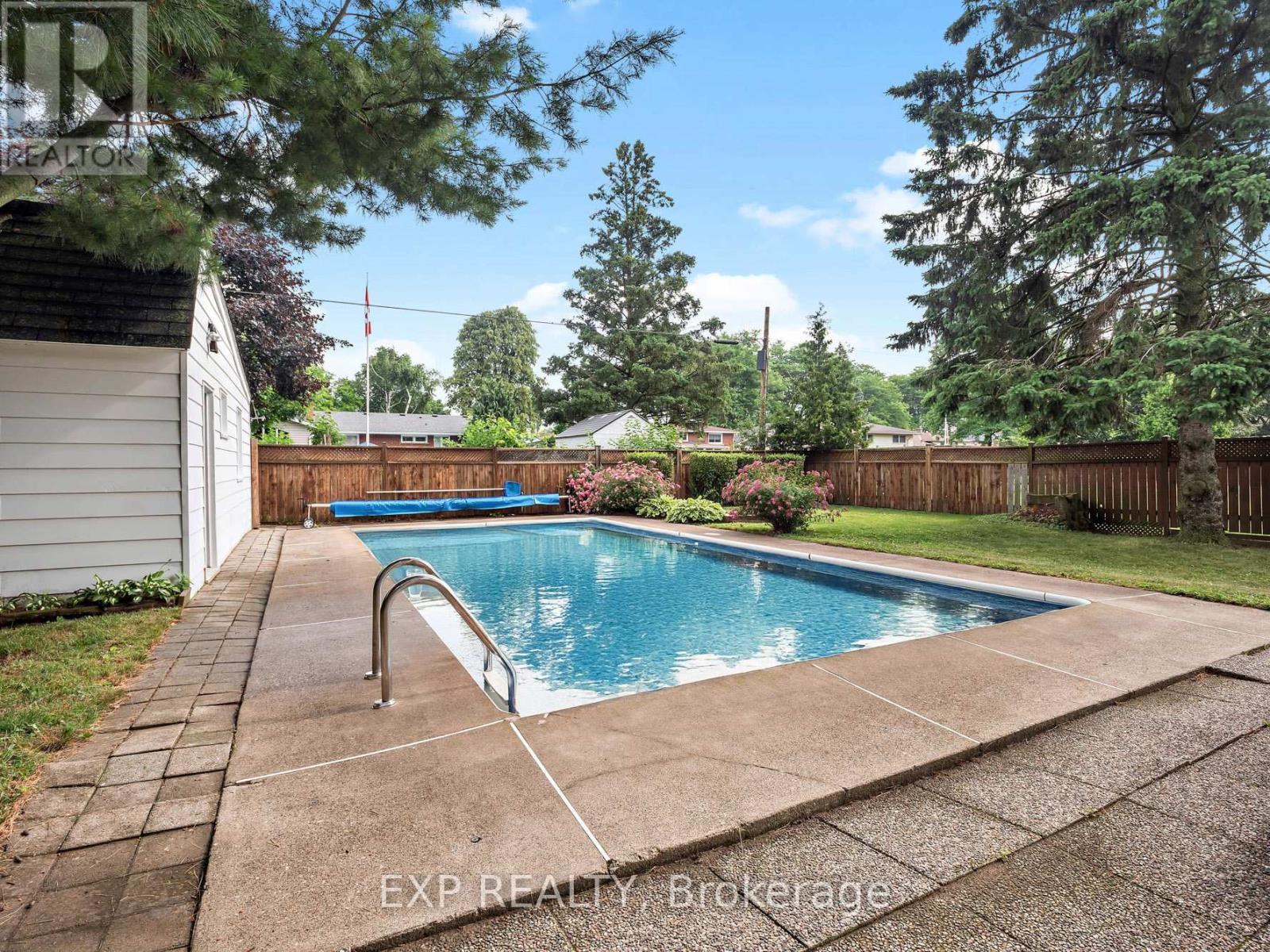 6711 Mcmicking Street, Niagara Falls (Stamford), ON - Outdoor With In Ground Pool