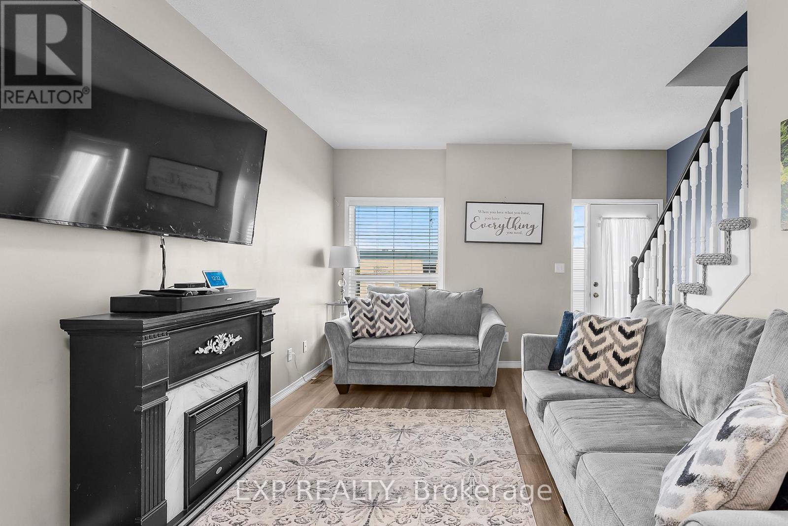 9 - 170 Dewitt Road, Hamilton (Stoney Creek), ON - Indoor Photo Showing Living Room With Fireplace