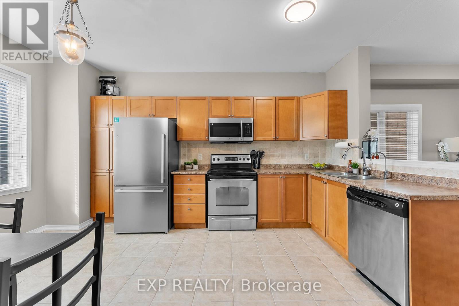 9 - 170 Dewitt Road, Hamilton (Stoney Creek), ON - Indoor Photo Showing Kitchen With Double Sink