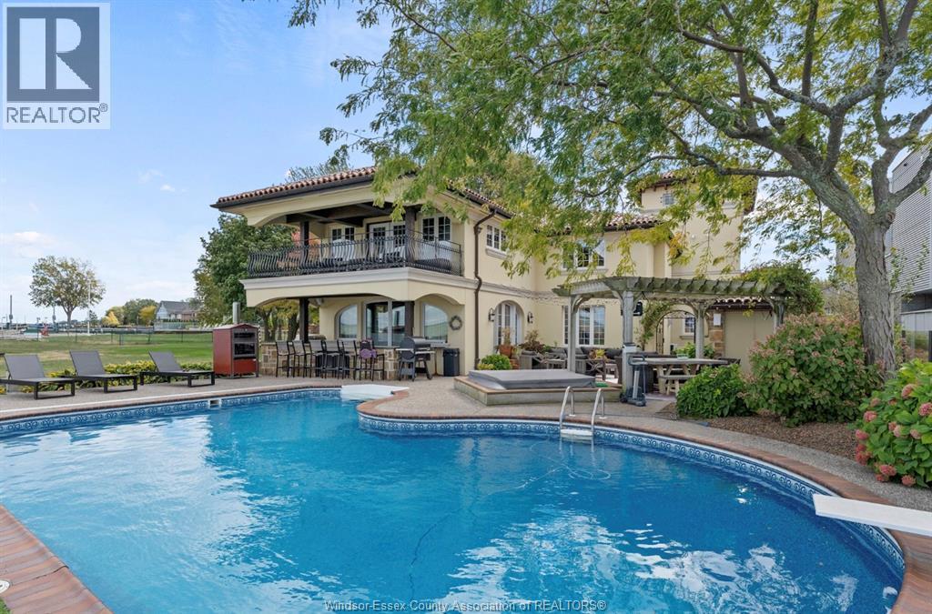 13038 Riverside Drive, Tecumseh, ON - Outdoor With In Ground Pool With Balcony With Backyard