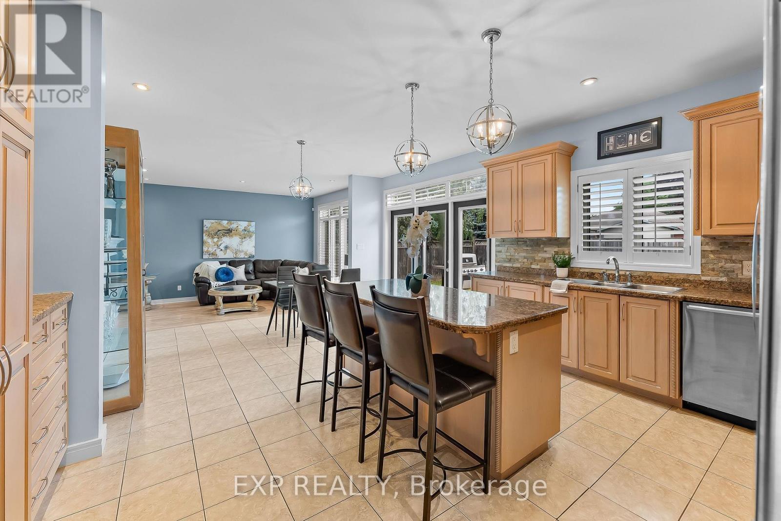 Centre Island-Kitchen - 7847 Cathedral Drive, Niagara Falls (Mt. Carmel), ON - Indoor Photo Showing Other Room