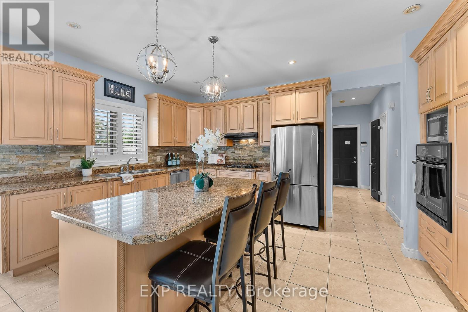 Kitchen Island Seating - 7847 Cathedral Drive, Niagara Falls (Mt. Carmel), ON - Indoor Photo Showing Kitchen With Double Sink