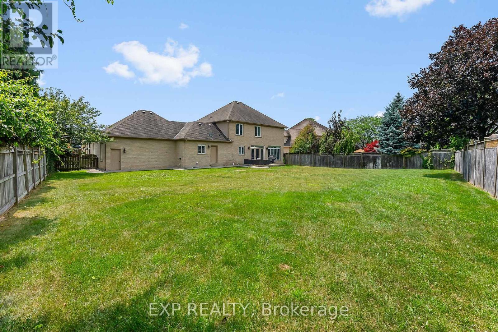 Three points of entry to the home from backyard - 7847 Cathedral Drive, Niagara Falls (Mt. Carmel), ON - Outdoor With Backyard