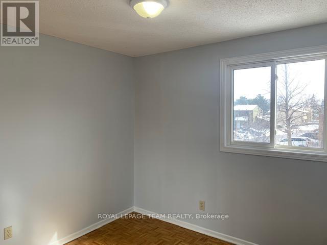 E - 14 Larkshire Lane, Ottawa, ON - Indoor Photo Showing Other Room