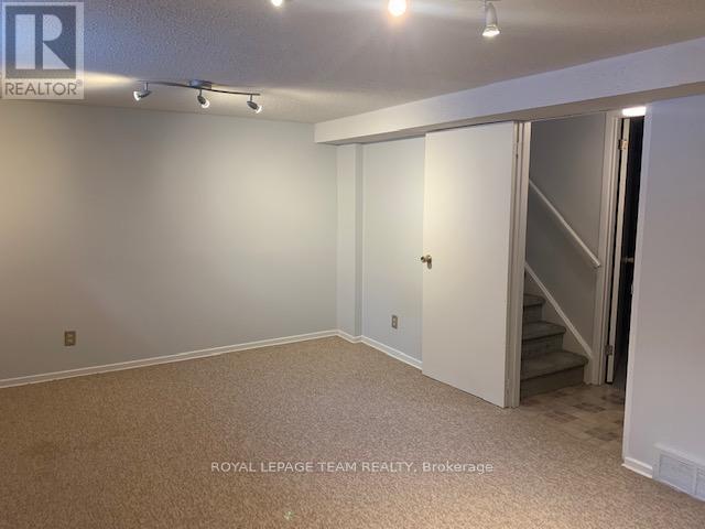 E - 14 Larkshire Lane, Ottawa, ON - Indoor Photo Showing Other Room