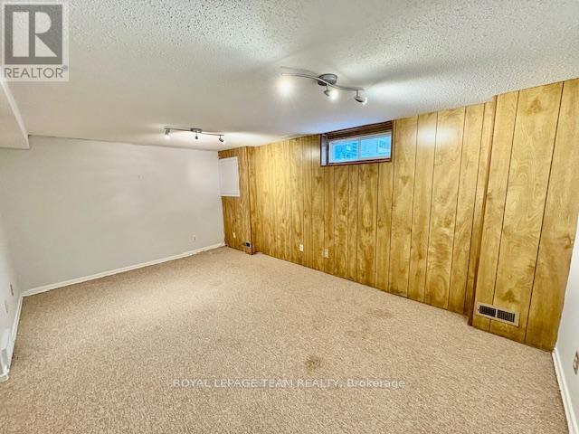 E - 14 Larkshire Lane, Ottawa, ON - Indoor Photo Showing Other Room