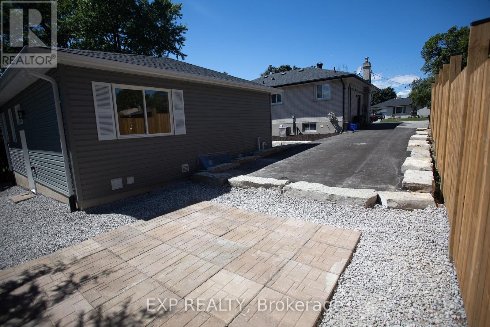 2 Tandem Parking Spaces - Garden Suite - 277 Grove Street E, Barrie (Wellington), ON - Outdoor With Exterior