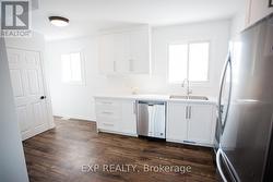 Kitchen & Laundry Closet - Unit A (Upper) -