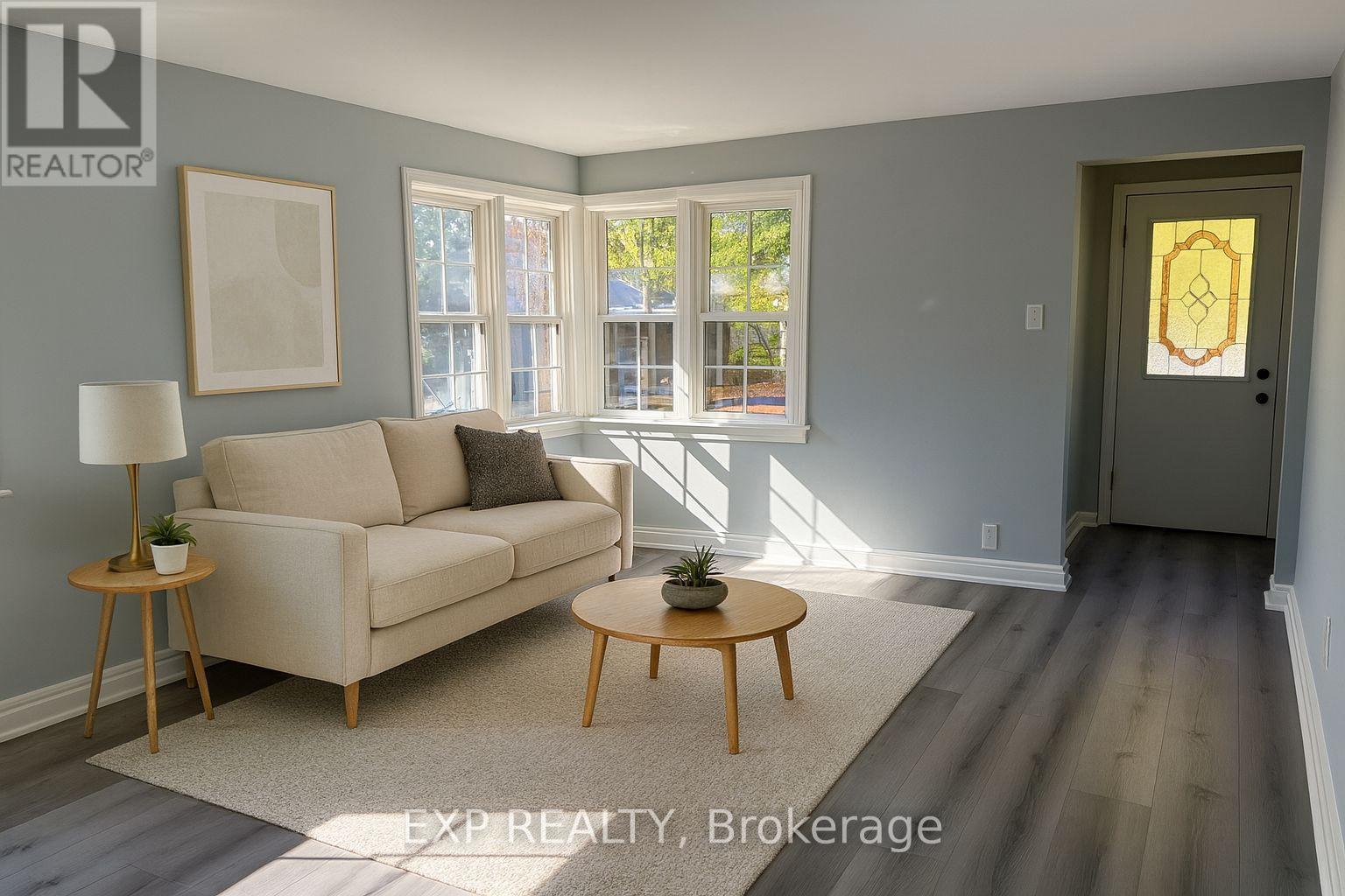 virtually staged - 20 Marmora Street, St. Catharines (E. Chester), ON - Indoor Photo Showing Living Room