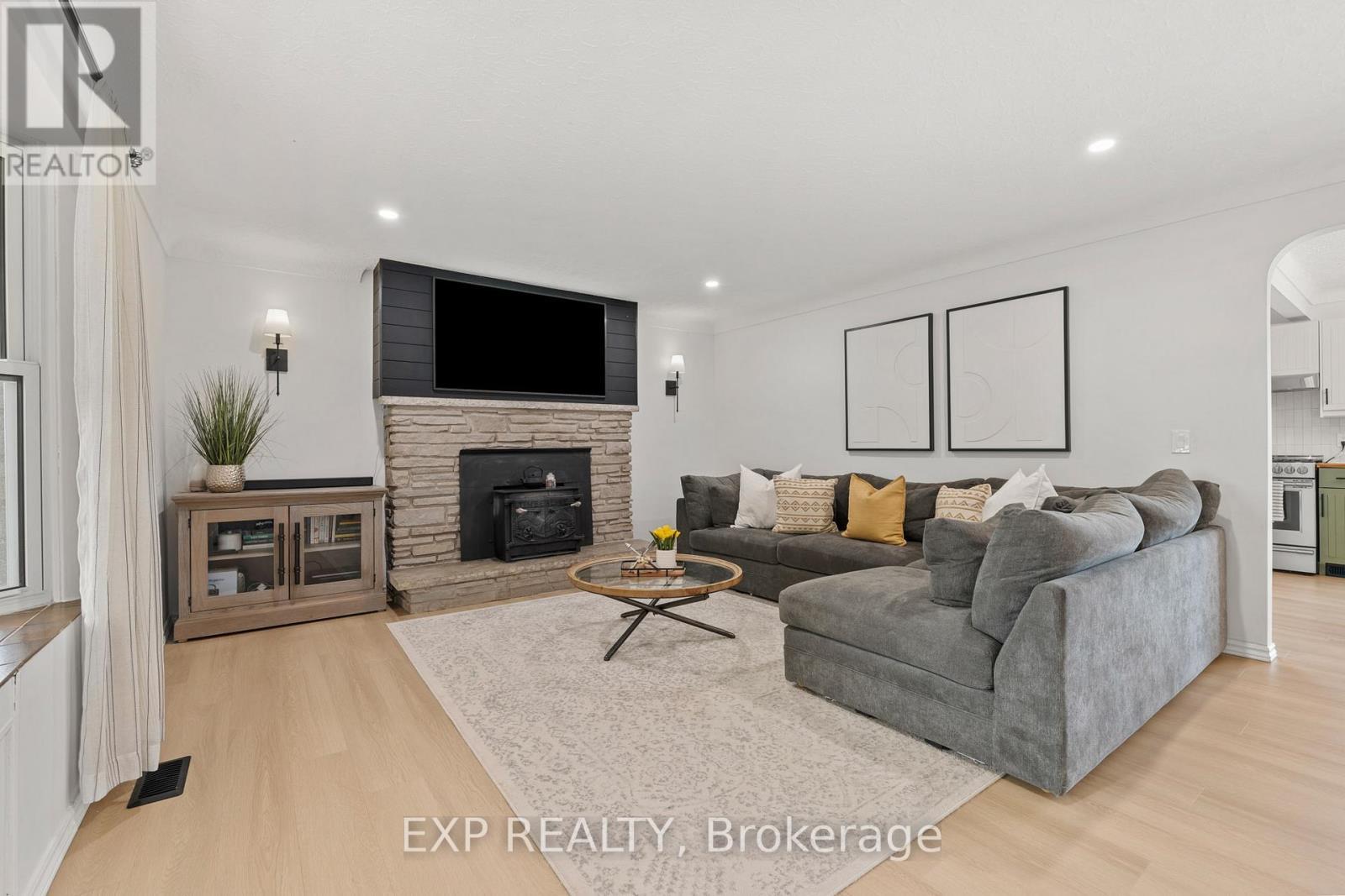 21419 Outred Road, Wainfleet (Marshville/Winger), ON - Indoor Photo Showing Living Room With Fireplace