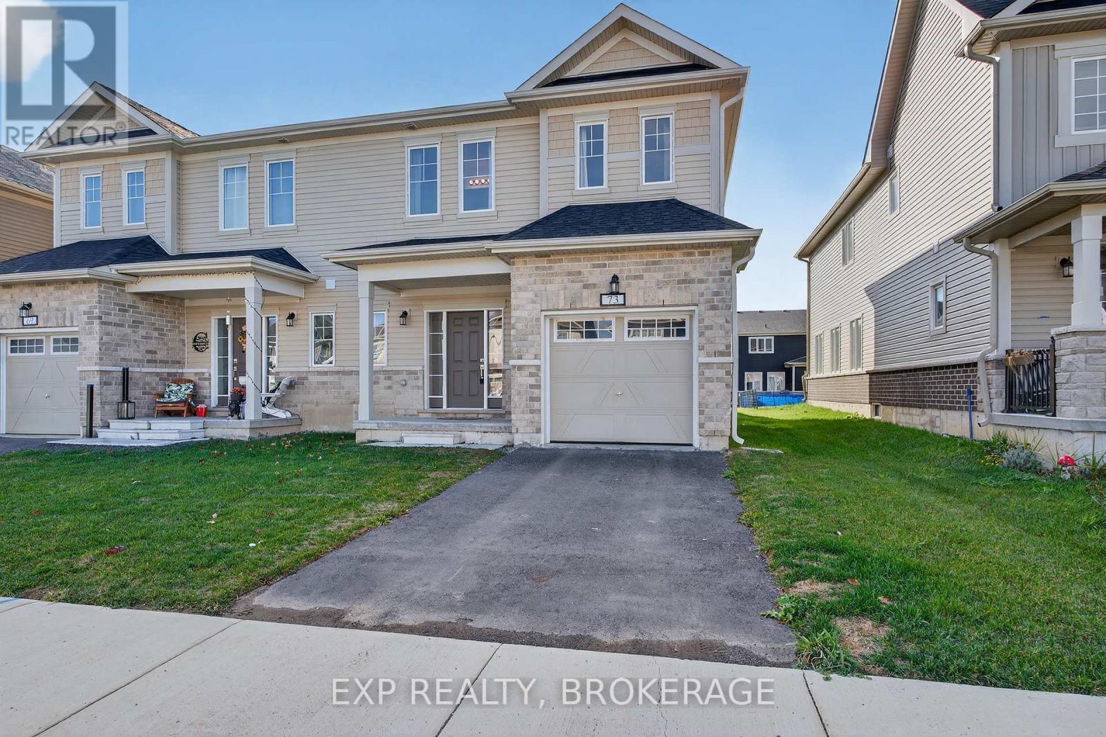 73 Oakmont Drive, Loyalist (Bath), ON - Outdoor With Facade