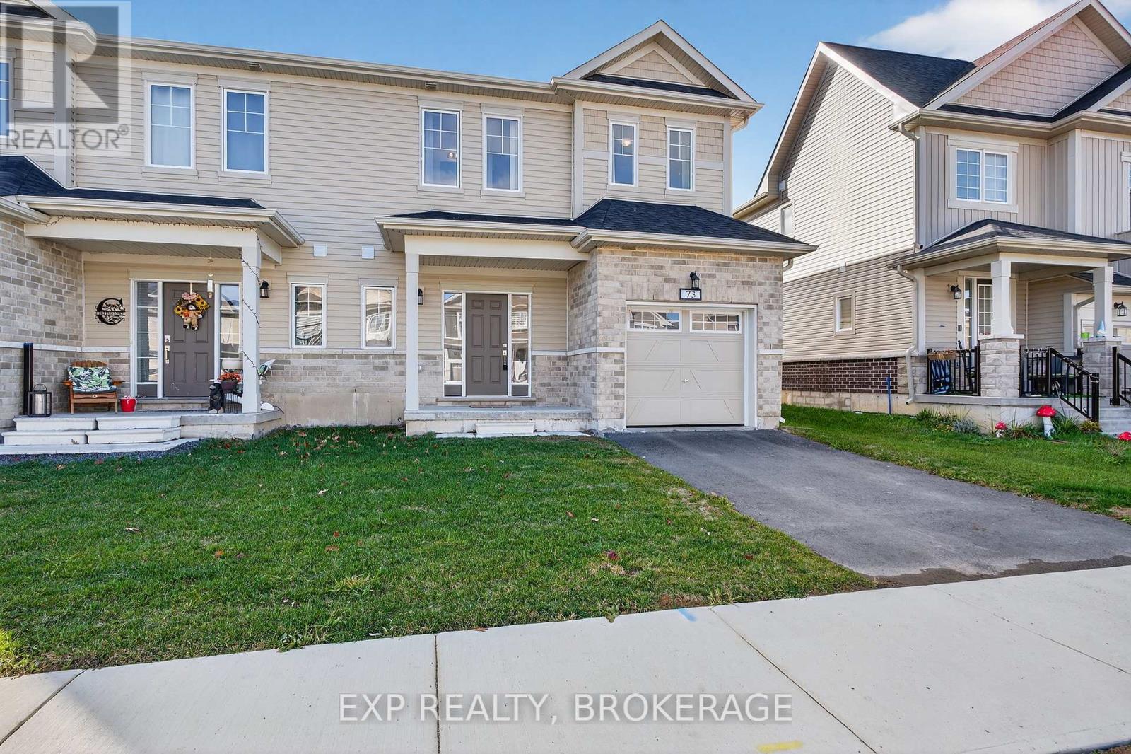 73 Oakmont Drive, Loyalist (Bath), ON - Outdoor With Facade