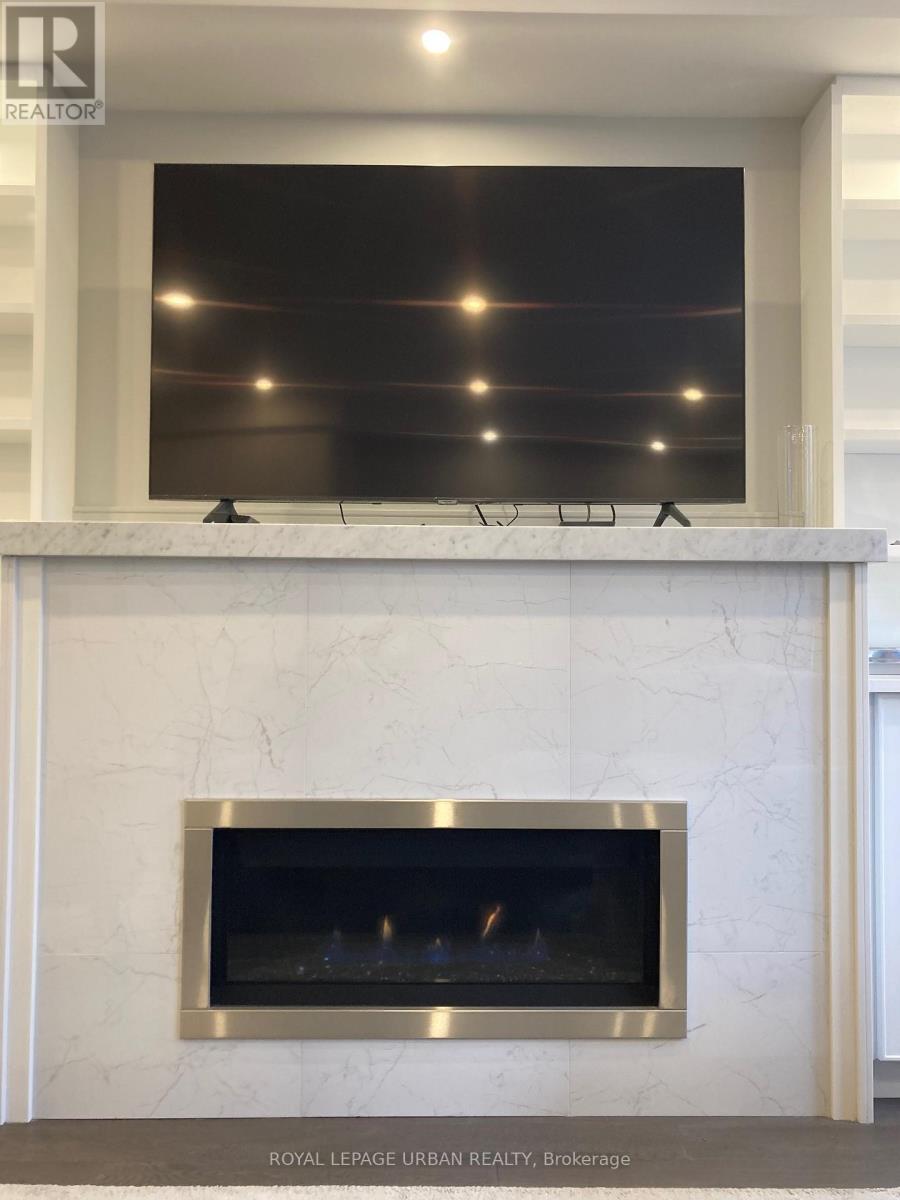 28 Sharpe Street, Toronto, ON - Indoor Photo Showing Living Room With Fireplace