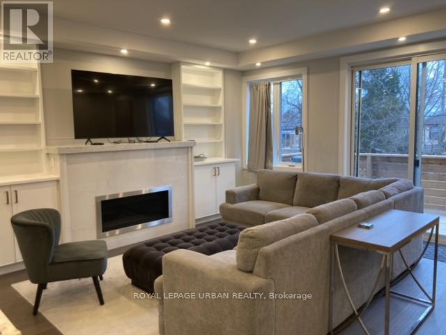 28 Sharpe Street, Toronto, ON - Indoor Photo Showing Living Room With Fireplace