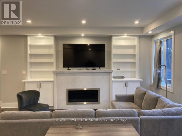 28 Sharpe Street, Toronto, ON - Indoor Photo Showing Living Room With Fireplace