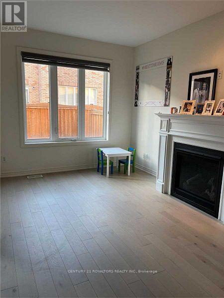 12 Foliage Drive, Brampton, ON - Indoor Photo Showing Living Room With Fireplace