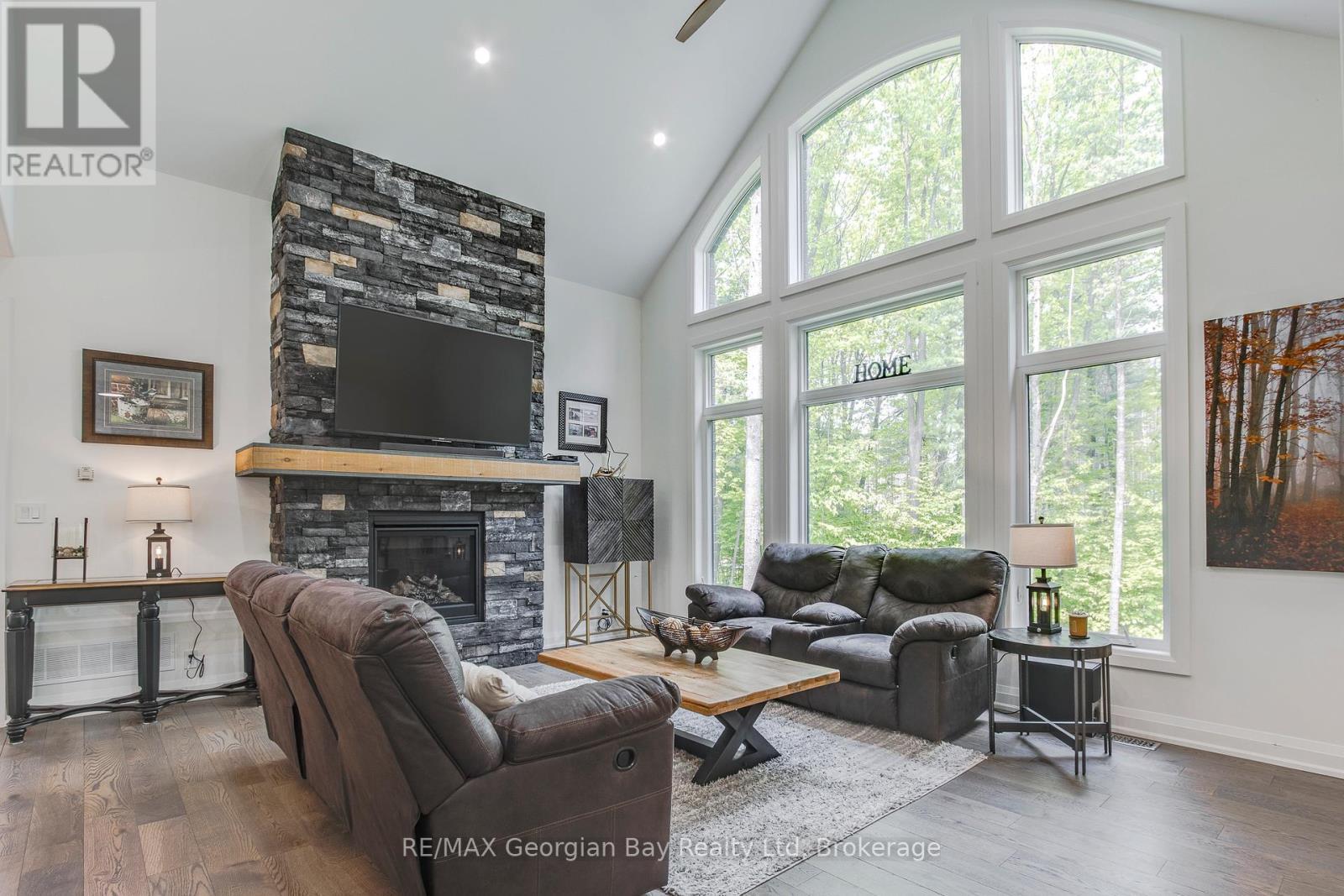 50 Windermere Circle, Tay, ON - Indoor Photo Showing Living Room With Fireplace