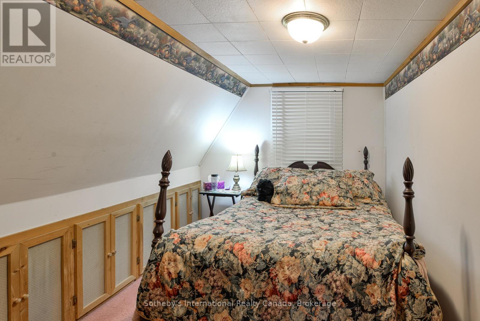 Upstairs bedroom. - 1079 Hewlitt Road, Muskoka Lakes (Monck (Muskoka Lakes)), ON - Indoor Photo Showing Bedroom