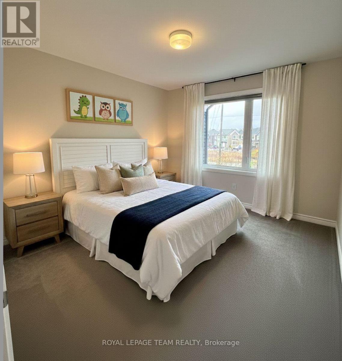 Bedroom 2 staged - 709 Megrez Way E, Ottawa, ON - Indoor Photo Showing Bedroom