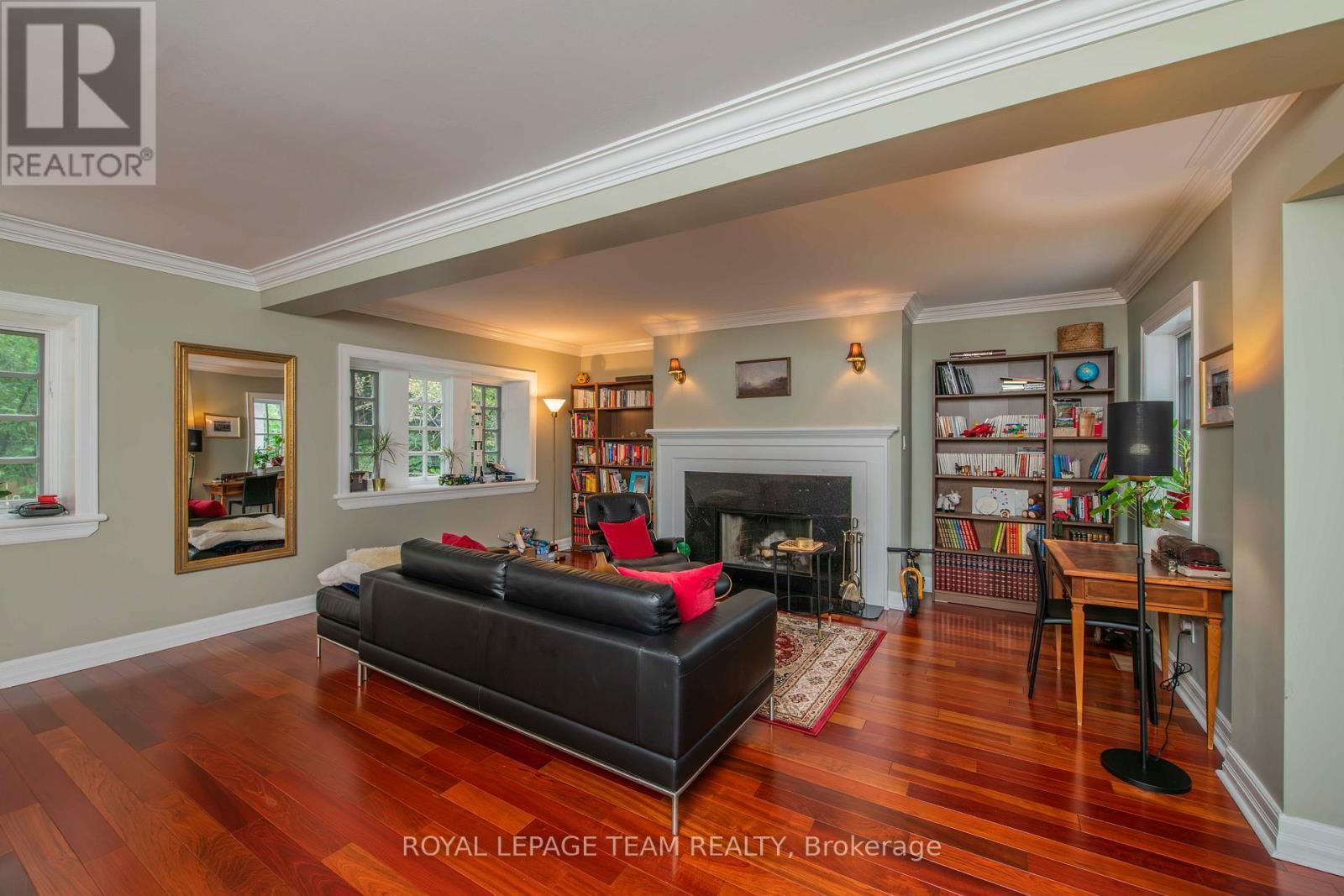 60 Goulburn Avenue, Ottawa, ON - Indoor Photo Showing Living Room With Fireplace