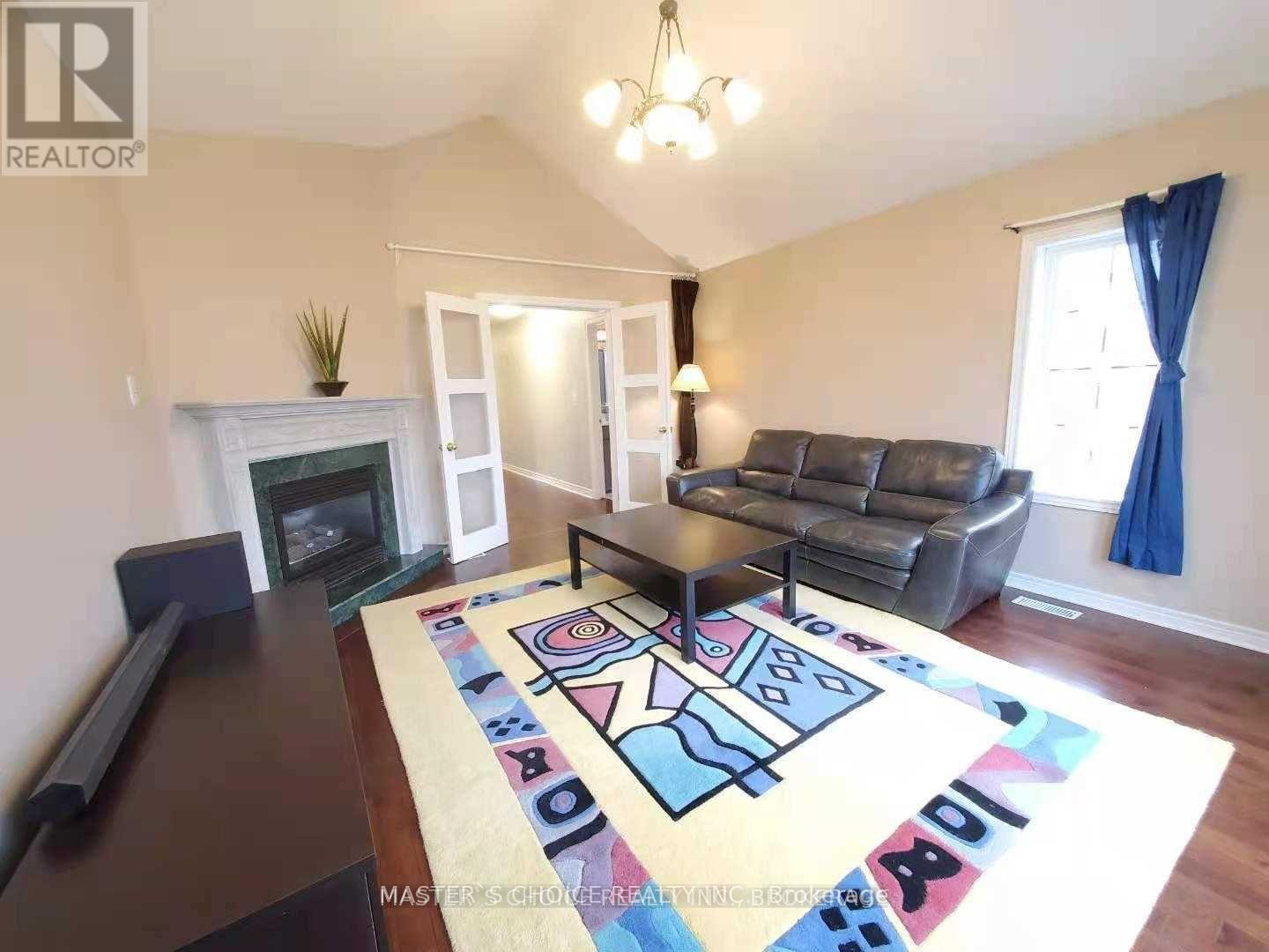 24 Golden Oak Avenue, Richmond Hill, ON - Indoor Photo Showing Living Room With Fireplace
