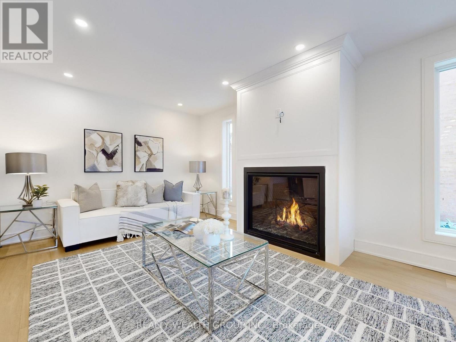 46 Sycamore Drive, Markham, ON - Indoor Photo Showing Living Room With Fireplace