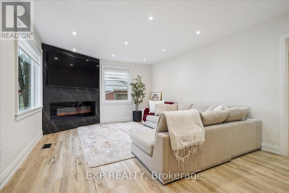 10 Harold Street, Brampton, ON - Indoor Photo Showing Living Room With Fireplace