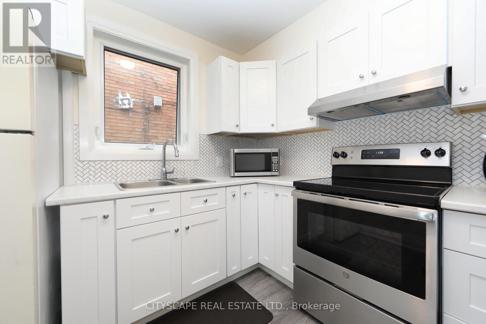 Main - 459 Hopewell Avenue N, Toronto, ON - Indoor Photo Showing Kitchen With Double Sink