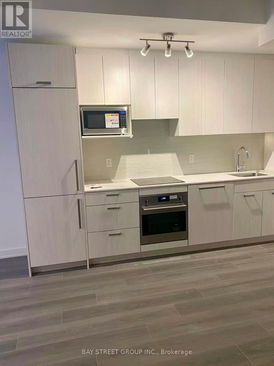 177 - 67 Curlew Drive, Toronto, ON - Indoor Photo Showing Kitchen