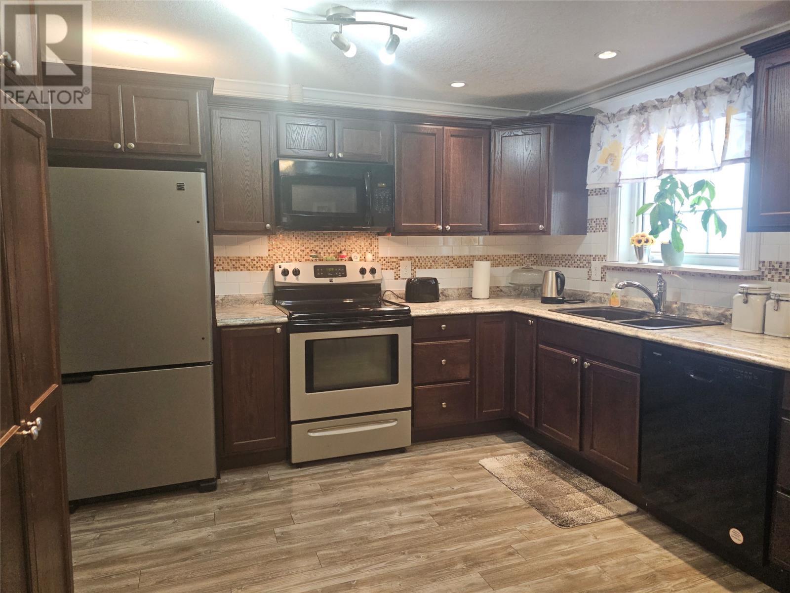 2 Musseau'S Lane, Channel-Port Aux Basques, NL - Indoor Photo Showing Kitchen With Double Sink