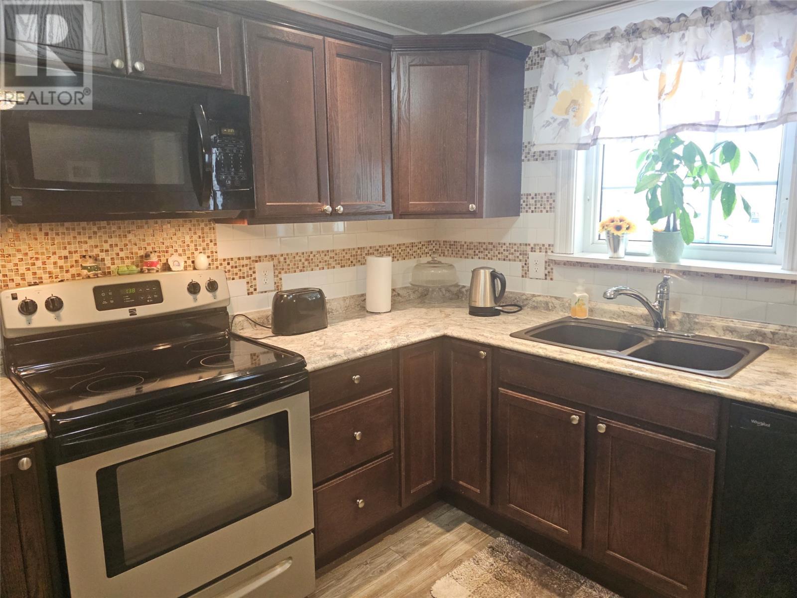 2 Musseau'S Lane, Channel-Port Aux Basques, NL - Indoor Photo Showing Kitchen With Double Sink