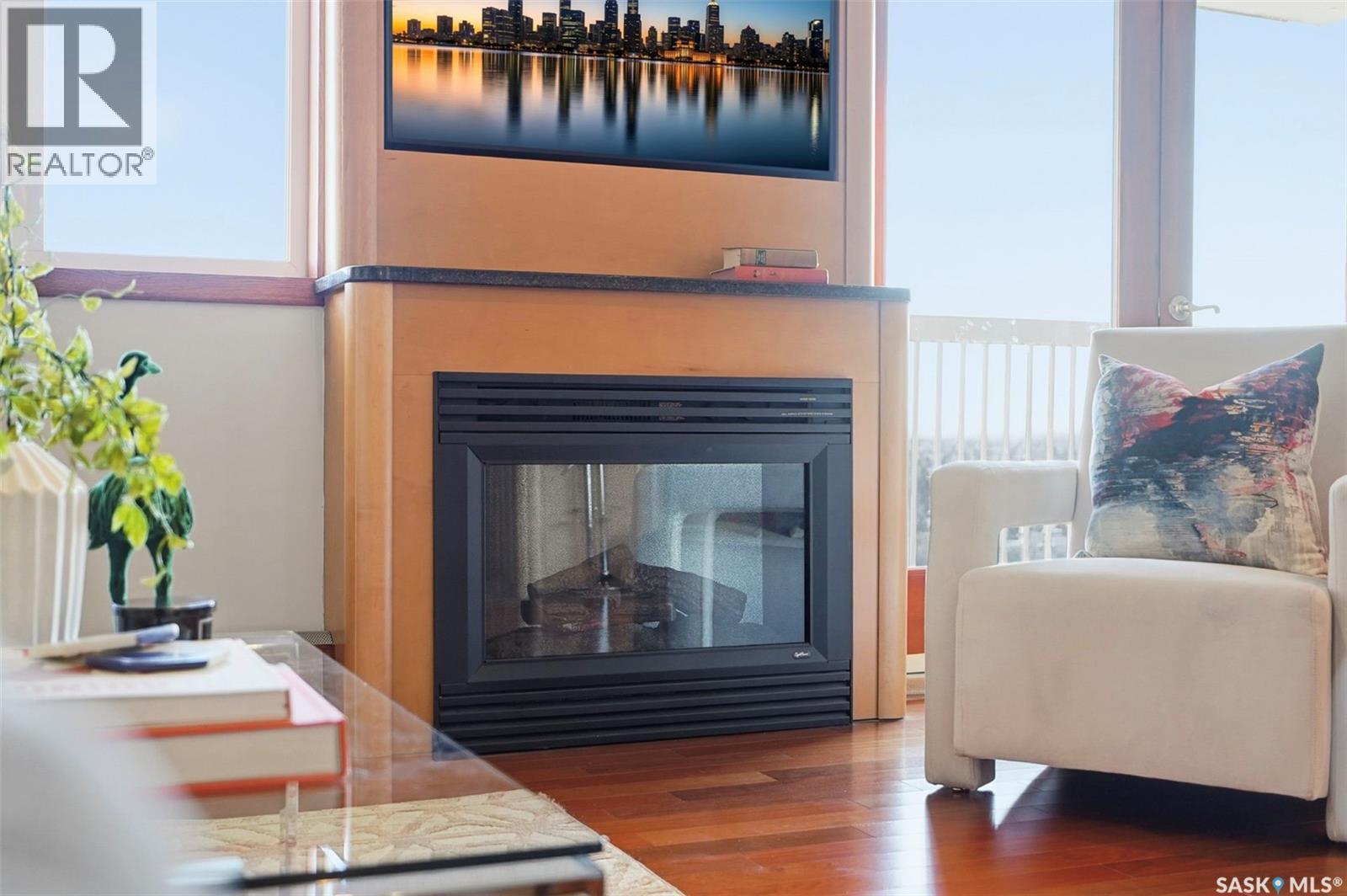 2504/2505 311 6Th Avenue N, Saskatoon, SK - Indoor Photo Showing Living Room With Fireplace