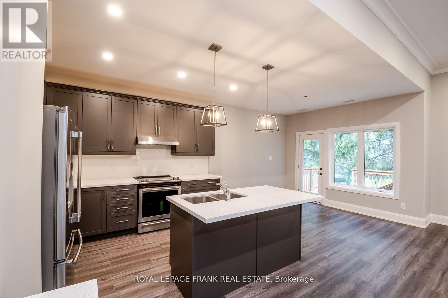 16040 Simcoe Street, Scugog (Port Perry), ON - Indoor Photo Showing Kitchen With Double Sink With Upgraded Kitchen