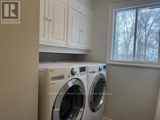Laundry in Bathroom - 587317 9Th Side Road, Blue Mountains, ON - Indoor Photo Showing Laundry Room