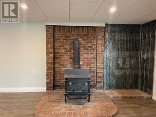 Rec room - 587317 9Th Side Road, Blue Mountains, ON - Indoor Photo Showing Other Room With Fireplace