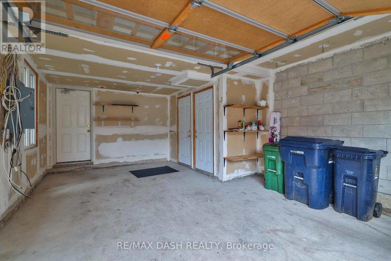 57 Ted Wray Circle, Toronto, ON - Indoor Photo Showing Garage