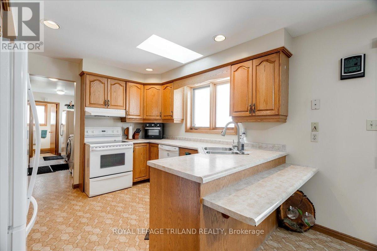 22775 Dogwood Road, Southwest Middlesex, ON - Indoor Photo Showing Kitchen With Double Sink