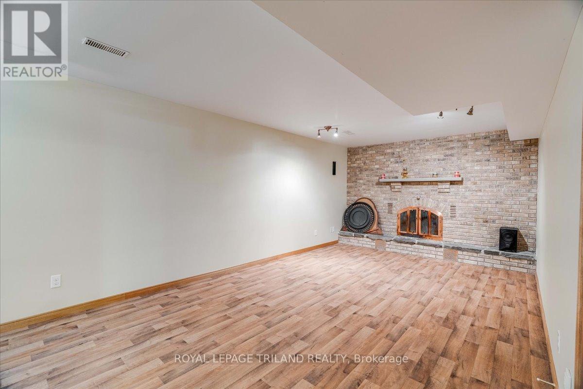 22775 Dogwood Road, Southwest Middlesex, ON - Indoor With Fireplace