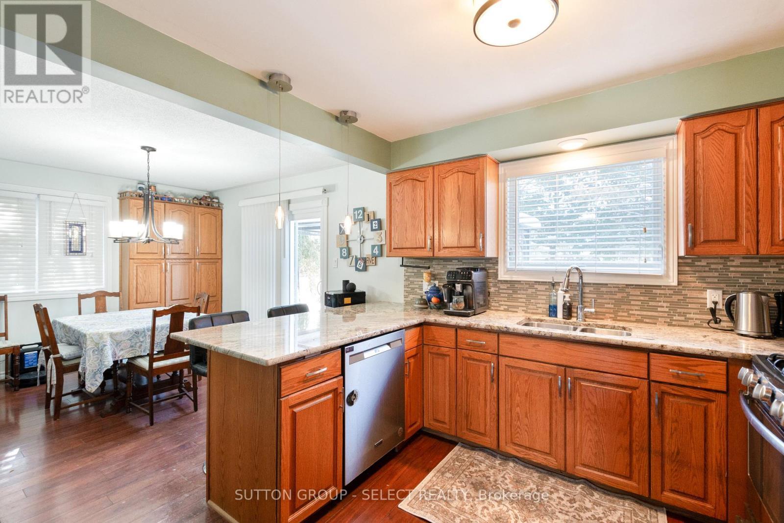 97 Tiner Avenue, Thames Centre (Dorchester), ON - Indoor Photo Showing Kitchen With Double Sink