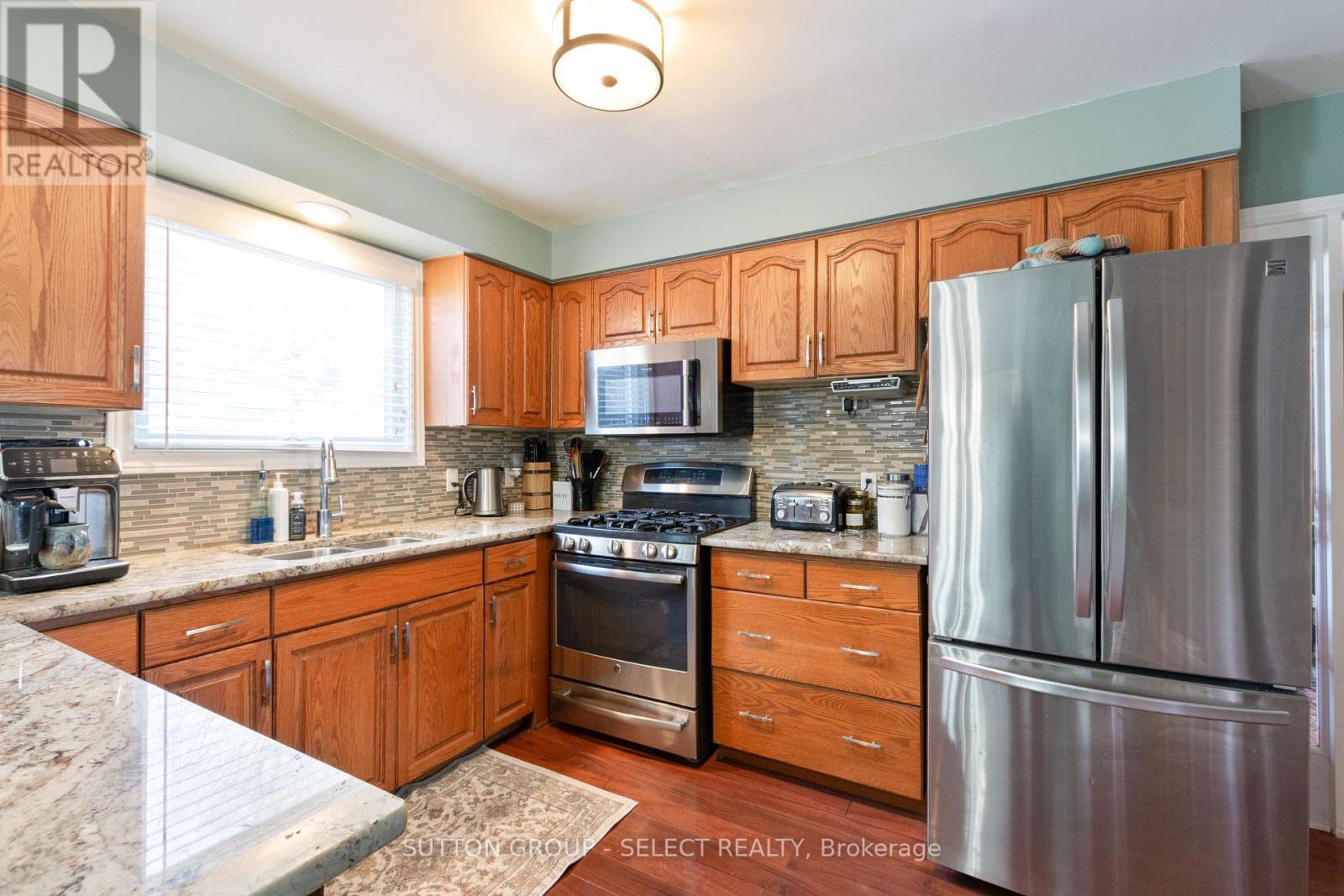 97 Tiner Avenue, Thames Centre (Dorchester), ON - Indoor Photo Showing Kitchen With Stainless Steel Kitchen With Double Sink