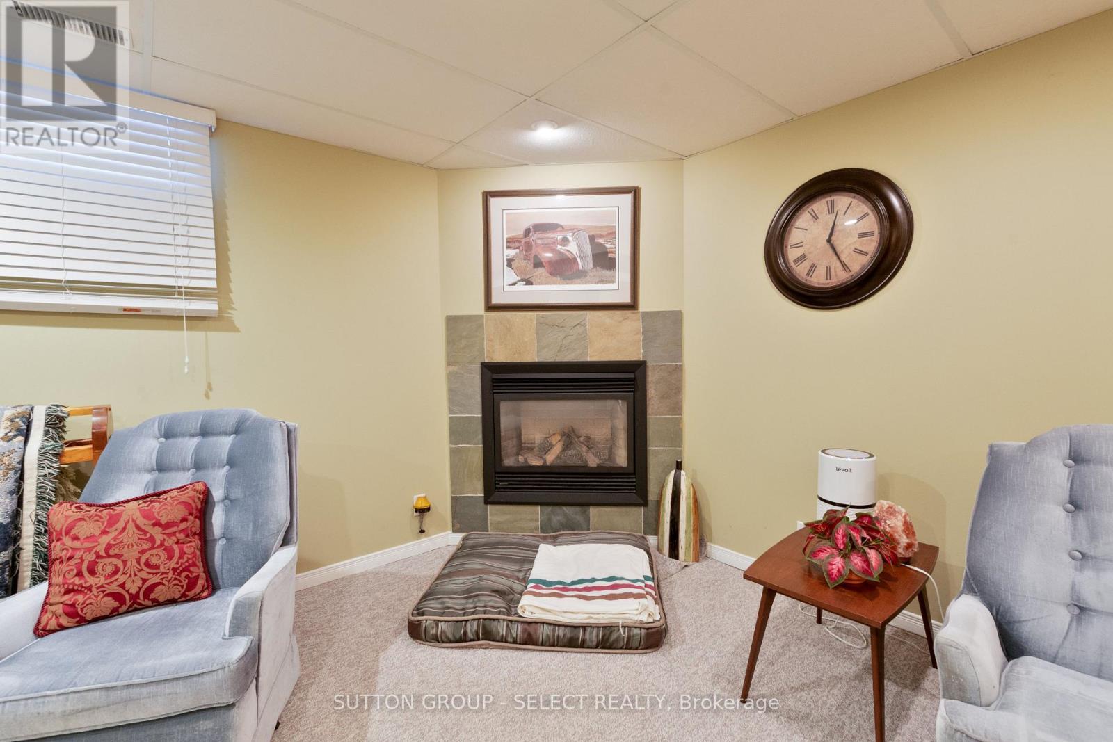 97 Tiner Avenue, Thames Centre (Dorchester), ON - Indoor With Fireplace