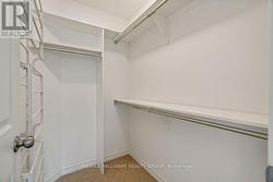 Walk-In Closet in Primary Bedroom -