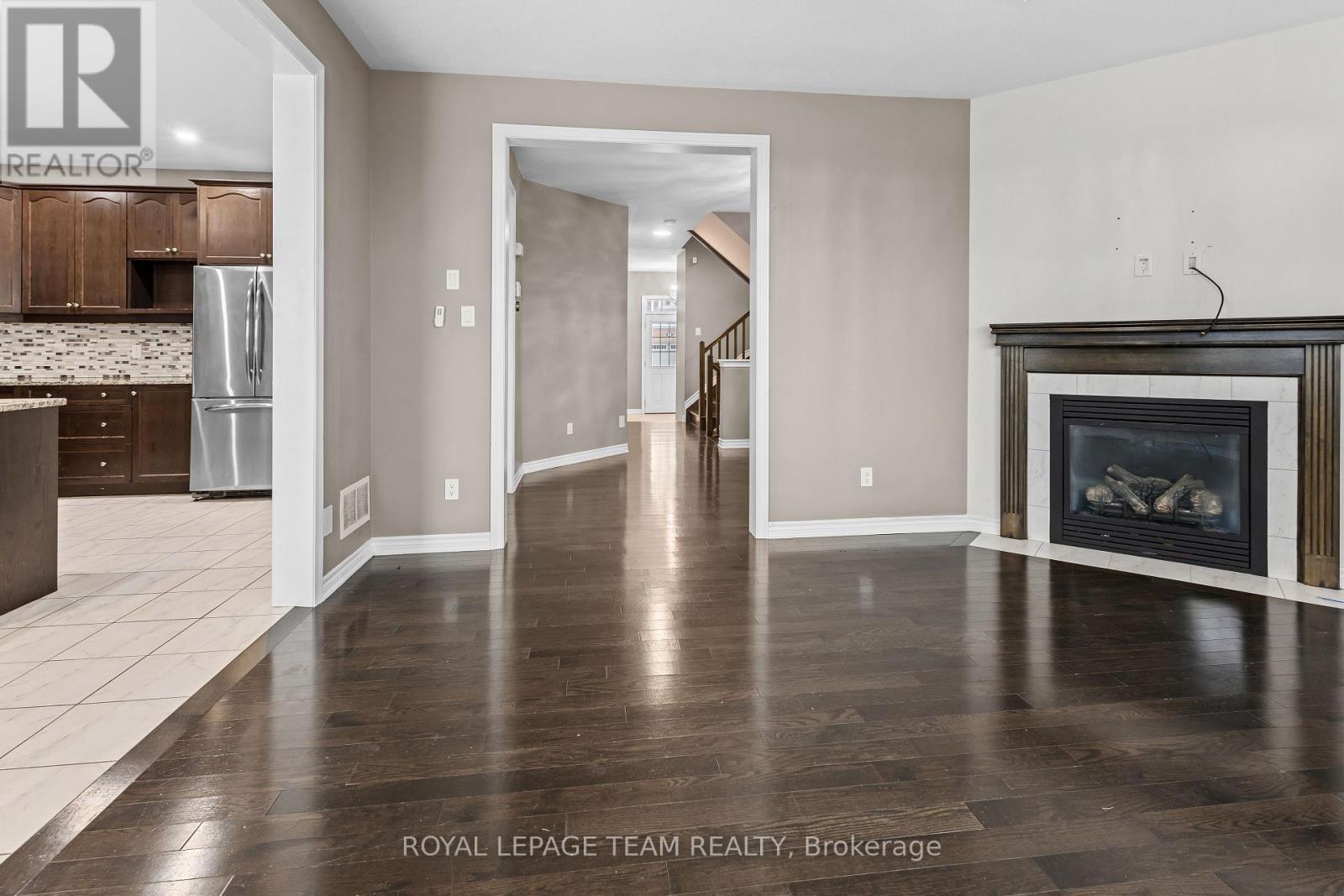103 Coriolis Court, Ottawa, ON - Indoor Photo Showing Living Room With Fireplace