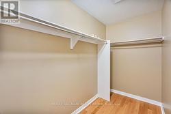 Walk-In Closet in Primary Bedroom -